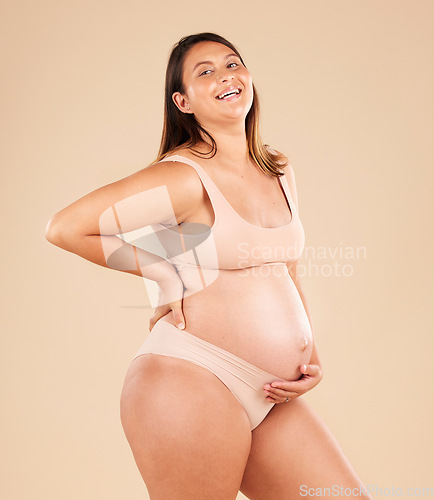 Image of Laughing, body or holding pregnancy stomach in underwear on studio background protection, woman love or baby support. Smile, happy or funny pregnant mother with belly or joke on mock up