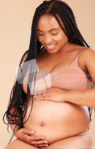 Image of Pregnancy feeling, lingerie or relax woman with studio smile, happy and excited for baby, stomach growth or motherhood. Gynecology, maternity or pregnant African model with healthcare, love and hope