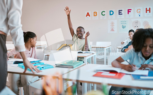 Image of Question, school and education with a black boy student hand raised in a classroom to ask or answer his teacher. Kids, asking and learning with a young male child in class to study for growth