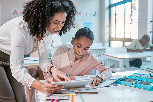 Image of Female teacher helping young girl, teaching creative work in book and children in sunny classroom. Education empowerment in school, educator speaking to student and learning mathematics at desk