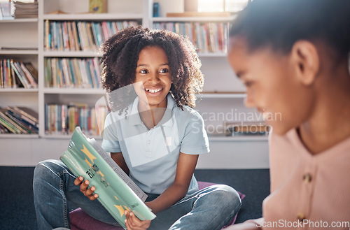 Image of Library, reading and happy, african children learning, education and English language for group development. Books, knowledge and school or classroom kid or friends for creative storytelling on floor