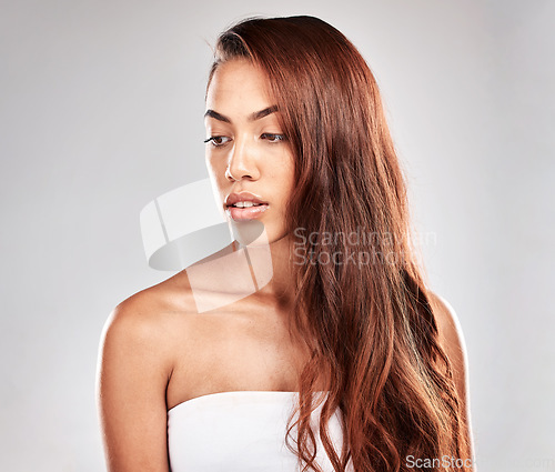 Image of Woman is thinking with hair, face and beauty, skin and care glow with shine isolated on studio background. Hairstyle, cosmetic skincare and mockup with wellness, keratin treatment and styling