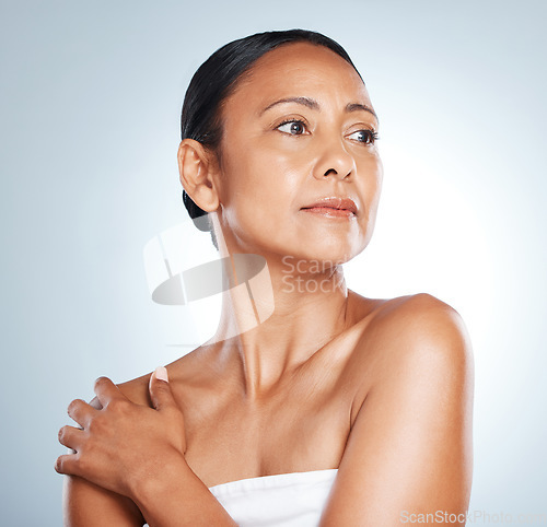 Image of Thinking, skincare and senior black woman in studio with healthy glow and body care of people. Wellness, aesthetic and dermatology treatment of mature person on isolated gray background.