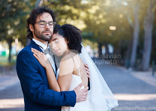 Image of Wedding, bride and groom hug with love, care and celebration in outdoor garden. Bridal couple, marriage and romance with calm support, trust and peace from partner, commitment union and relax at park