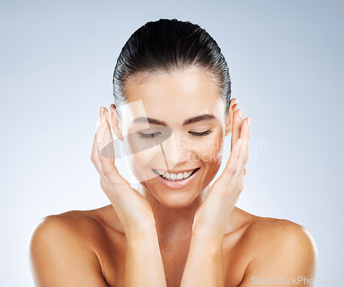 Image of Happy, health and skincare of natural woman with smile for hydration, self care and glow aesthetic of people. Dermatology, beauty and healthy skin of person on isolated gray studio background