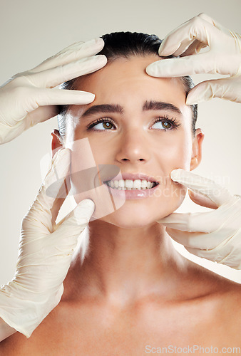 Image of Beauty, plastic surgery and filler on face of woman with collagen dermatology cosmetics. Headshot of a skincare model with professional hands for medical procedure on facial skin and grey background