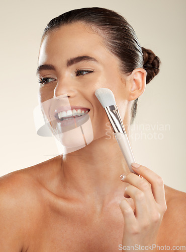 Image of Brush for makeup, face and happy with woman, beauty and skincare with cosmetic tools isolated on studio background. Happiness, glow and cosmetics, healthy skin and wellness with microblading