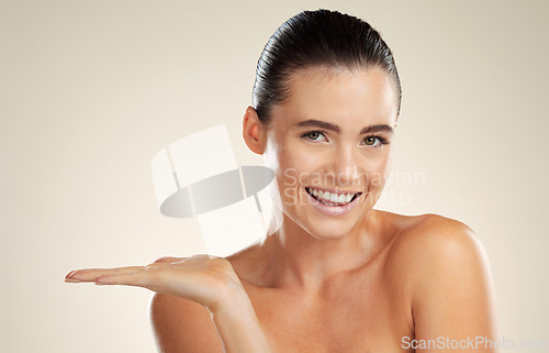 Image of Skincare, beauty and hand of woman portrait with space for mockup product placement in studio. Aesthetic model advertising makeup, facial cosmetics and dermatology for skin with spa promotion deal