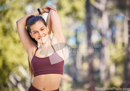 Image of Fitness, stretching arms and portrait of woman in nature with smile for running, marathon training and workout. Sports mockup, healthy body and girl in forest park for wellness, cardio and active