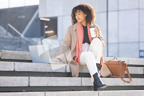 Image of Search, thinking or black woman with laptop in city of London for internet research, communication or networking. Creative, data analysis or remote work on tech for social network, web or blog review