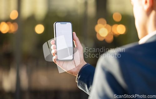 Image of Mockup, screen or business man on phone for networking, social media or communication in London street. Search, city or manager on 5g smartphone for research, internet or blog content review outdoor