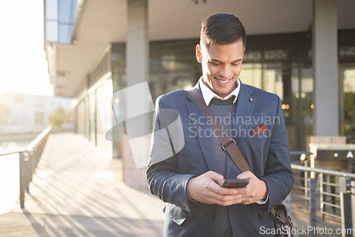 Image of Happy, business man or travel with phone for networking, social media or communication in London street. Search, email or professional on 5g smartphone for research, internet or blog review outdoor