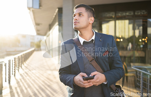 Image of City, thinking or business man with phone for internet research, communication or networking. Tech, online or professional in street on 5g smartphone for social network, blog review or media search