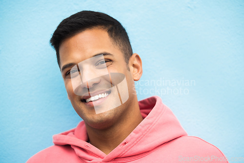 Image of Fashion, smile and portrait of man on blue background with positive mindset, confidence and happiness. Mockup, freedom and isolated face of male with happy attitude or relax model in Brazil