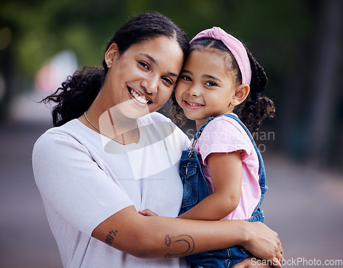 Image of Portrait, mother and kid hug in park, fun day outdoor with love and care, happy people together in nature. Family, happiness and bonding with childhood, woman and girl are content with smile