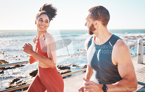 Image of Running, fitness and exercise with a sports couple outdoor in summer for cardio or endurance by the ocean. Health, training and sea with a man and woman runner on a promenade for a workout together
