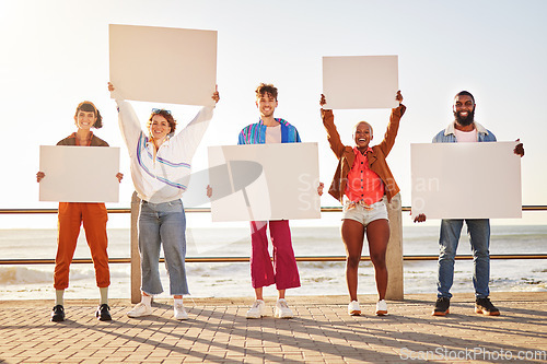 Image of Portrait, poster and diversity with friends together holding signage in protest on the promenade by the sea. Freedom, mockup and billboard with a man and woman friend group holding blank sign boards