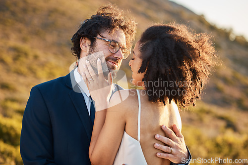 Image of Love, happy and wedding with couple in nature for celebration, happiness and romance. Sunset, hug and affectionate with man and woman in embrace at countryside for ceremony, marriage and smile