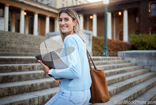 Image of Woman, student portrait on university stairs and campus education with learning and academic goals with scholarship outdoor. Laptop, study and happy person with success, college life and studying