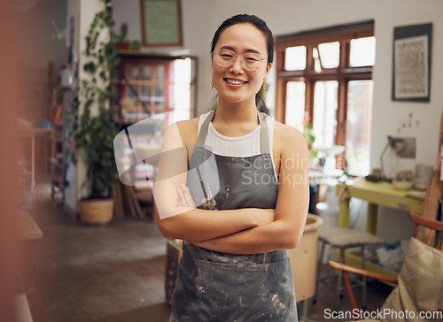 Image of Pottery, art class and business woman portrait for creative workshop vision, growth and pride. Asian artist with happy arms crossed for confidence in retail industry, trade or production process