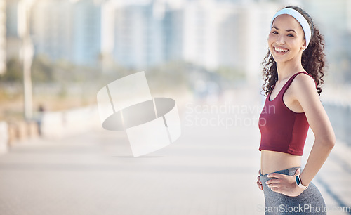 Image of Happy woman, portrait and fitness with arms akimbo in city for exercise, wellness and mockup in Miami. Female athlete, smile and standing ready for urban workout, summer training and sports marathon