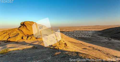 Image of Rock formation in Namib desert in sunset, landscape