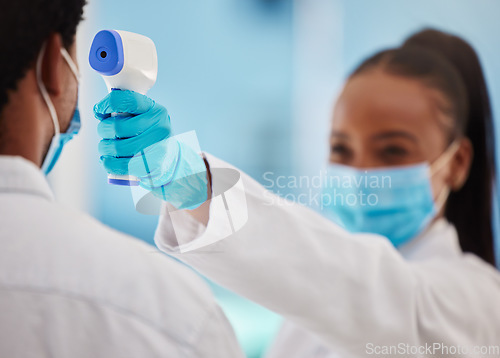 Image of Doctor, patient and Covid 19, healthcare and thermometer for temperature check zoom and black people in medicine. Face mask, Corona and virus prevention, man and woman in clinic for medical screening