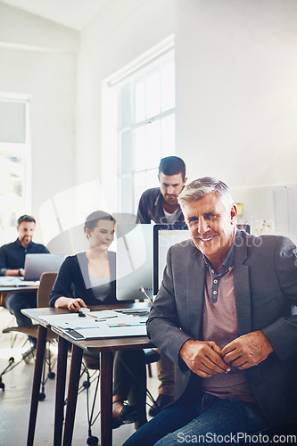 Image of Business, senior and portrait of man in office or company workplace. Leadership, ceo or happy elderly male employee or manager with coworkers working on marketing report, advertising or sales project