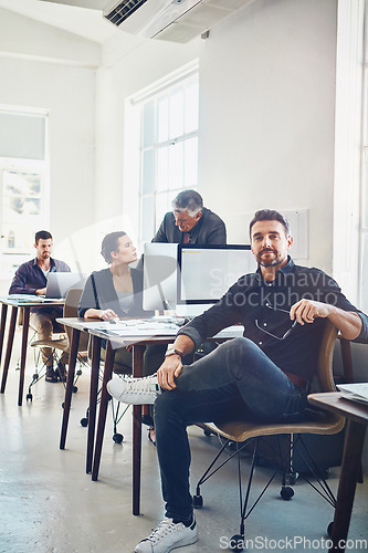 Image of Portrait, teamwork and business man in office workplace ready for targets or goals. Leadership, mature and male employee with coworkers working on marketing, advertising or sales project in company.