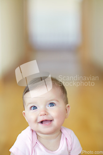 Image of Baby, mockup and growth with an adorable girl child looking curious in her home alone for development. Face, smile or mock up and a cute female infant with blue eyes in a house feeling happy