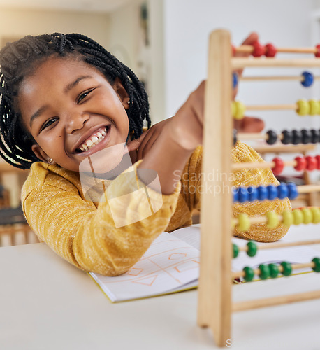 Image of Abacus, kid learning and portrait of a girl in a house with study paper and math homework. Happiness, school work and young child with a smile from knowledge development and numbers at a house desk