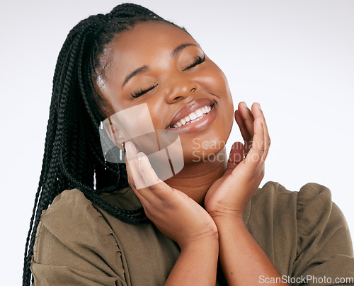 Image of Happy, smile and black woman with skincare, beauty and facial wellness in a studio. White background, isolated and skin glow of young model with dermatology detox, cosmetics and face self care