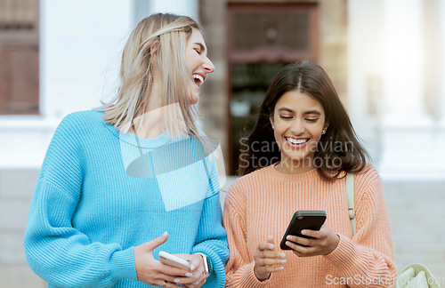 Image of Friends, women laugh at meme on smartphone, social media and students on campus, outdoor and comedy online. Connection, funny post and 5g network, communication and technology with Gen z youth