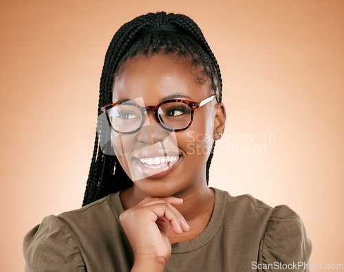 Image of Black woman, glasses and happy person in a studio with eyecare, beauty and smile. Brown background, isolated and gen z student with happiness feeling relax about youth thinking with hipster fashion