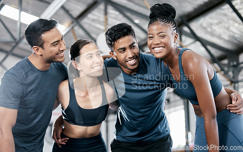 Image of Diversity, fitness and team with smile for exercise, workout or training together at the indoor gym. Happy diverse group of people in sports teamwork, huddle or hug smiling for healthy exercising