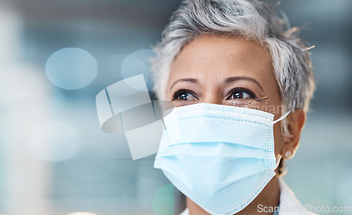 Image of Elderly woman, face mask and health with Covid, safety from virus and doctor in PPE with healthcare mockup. Medicine, wellness and medical professional with bokeh overlay, surgery and protection