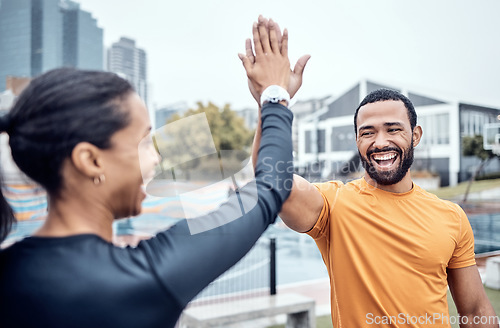 Image of Couple of friends, laughing and high five for sports, success and team support in city. Happy athletes, fitness motivation and celebration of achievement, wellness and smile of winning exercise goals