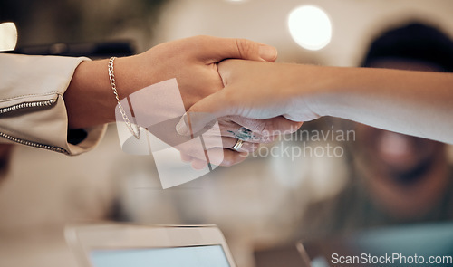 Image of Handshake, partnership and woman in cafe for business deal, agreement and collaboration for startup. Success, teamwork and people shaking hands in coffee shop for thank you, welcome and support