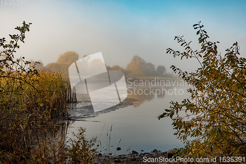 Image of The cool autumn morning at the pond