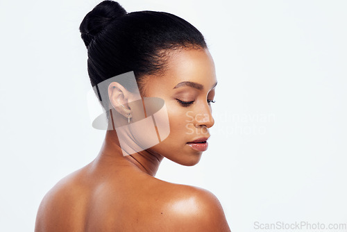 Image of Beauty, skincare and back of black woman in studio for wellness, healthy body and dermatology. Self care, spa aesthetic and girl profile with cosmetics, glowing and natural skin on white background