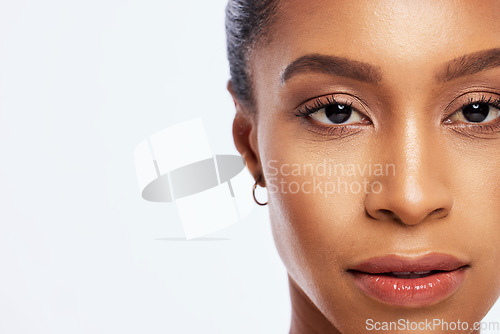 Image of Portrait, black woman and skincare mockup in studio, white background and isolated space. Serious female model face, facial beauty and cosmetics for dermatology, aesthetic makeup and salon wellness