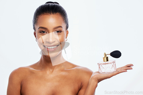 Image of Black woman, luxury perfume and skincare portrait for beauty wellness and fragrance in white background studio. African model smile, salon product mockup and cosmetics parfum isolated for advertising