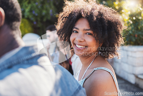Image of Happy, smile and portrait of a black woman at a party to relax with friends on a holiday in Miami. Summer, young and face of an African girl on vacation with a group of people for travel together