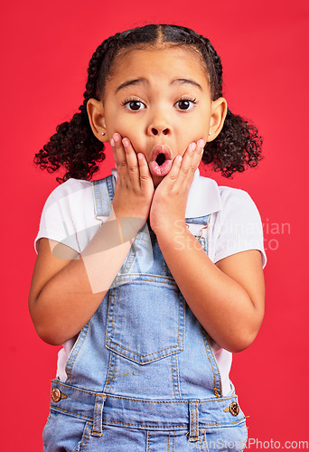 Image of Wow, surprise face and portrait of girl on red background for with omg, comic and shock facial expression. Kids fashion, mockup and cute girl in studio for promotion, sale and discount announcement