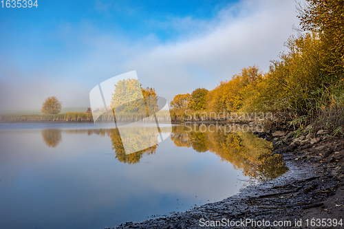 Image of The cool autumn morning at the pond