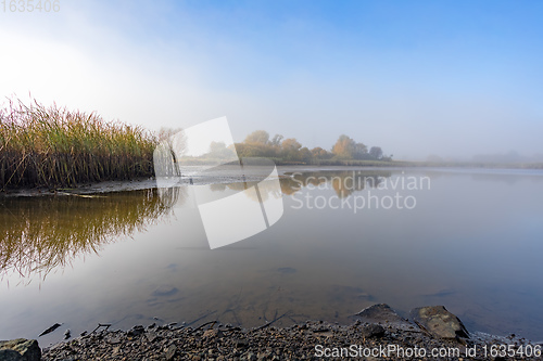 Image of The cool autumn morning at the pond