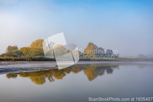 Image of The cool autumn morning at the pond