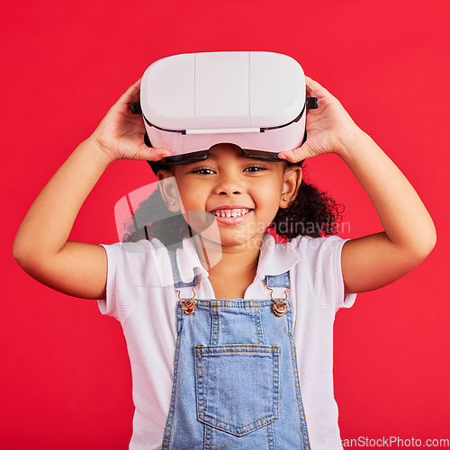 Image of Portrait, virtual reality or headset for children metaverse, 3d esports games or futuristic cyber gaming on red background. Smile, happy or playful kid and vr gamer technology for digital fantasy fun