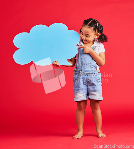 Image of Kid, pointing or speech bubble in ideas, opinion or vote on isolated red background in social media, vision or news. Smile, happy or child showing banner, paper or cardboard poster in speaker mockup