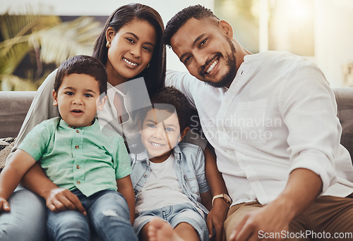 Image of Father, mother and kids with smile for family portrait, holiday break or weekend relaxing on living room sofa at home. Happy dad, mom and children smiling in joy for fun bonding relationship indoors